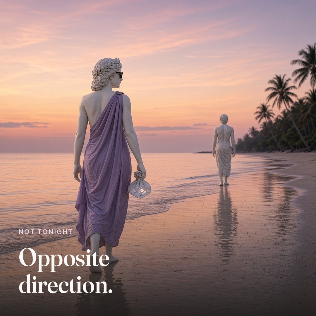 She walks the other way down the beach. The picture says Opposite direction.